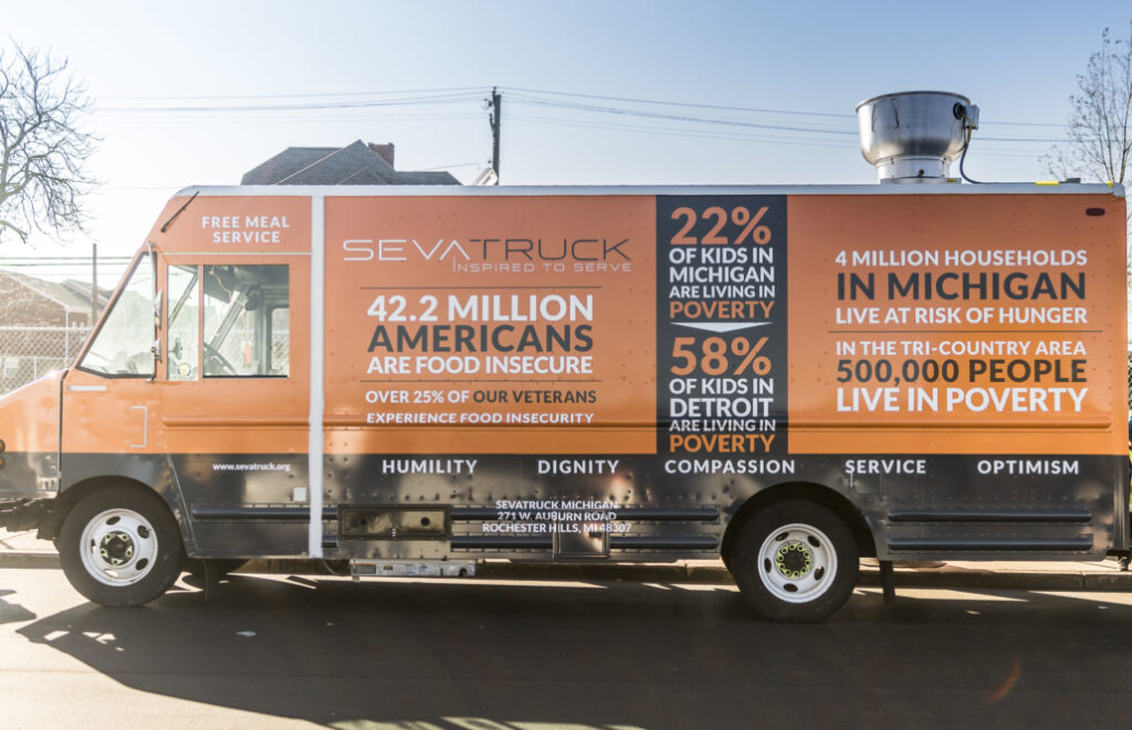 An orange SevaTruck.